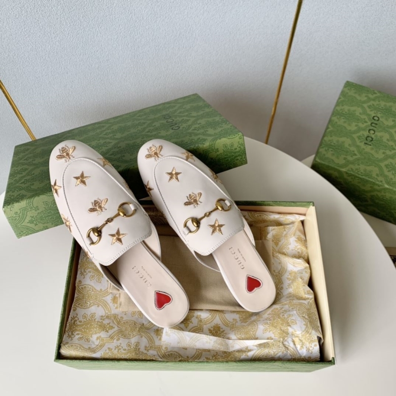 G*u*i slippers